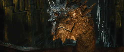 A Close Up Of A Dragon 'S Face Looking At The Camera GIF