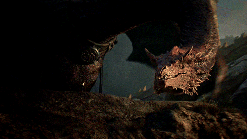 A Close Up Of A Dragon 'S Head And Neck GIF