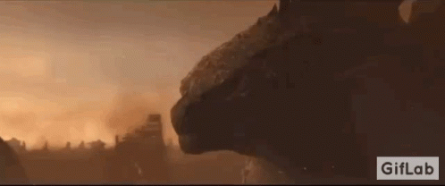 A Close Up Of A Dragon 'S Head In A Video Game . GIF