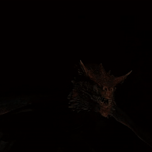 A Close Up Of A Dragon 'S Head Showing Its Teeth GIF