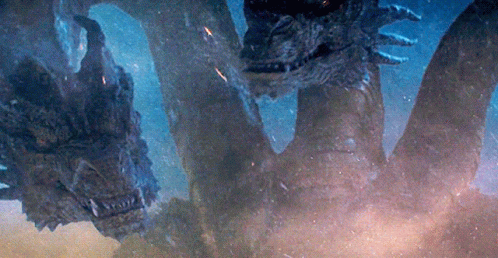 A Close Up Of A Dragon 'S Head With A Lot Of Sharp Teeth GIF