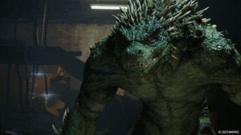 A Close Up Of A Dragon With A Marvel Logo On The Bottom Right GIF