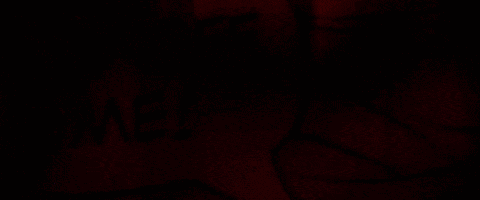 a close up of a drawing of a person 's face with a red background
