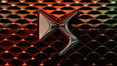 A Close Up Of A Ds Logo On A Red And Green Colored Background GIF
