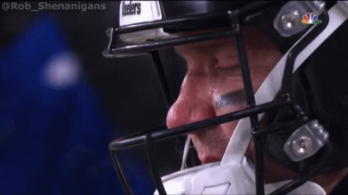 a close up of a football player wearing a helmet that says jackson 's on it