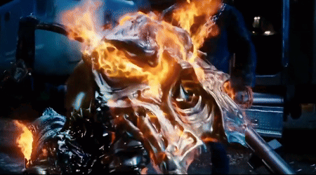 A Close Up Of A Ghost Rider Motorcycle On Fire GIF