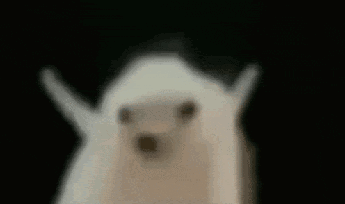 Ghost With Outstretched Arms In Dark GIF