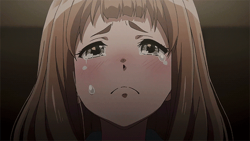A Close Up Of A Girl Crying With Tears Running Down Her Face GIF