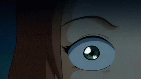 A Close Up Of A Girl 'S Eye With A Blue Pupil GIF