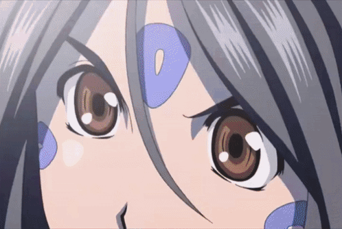 A Close Up Of A Girl 'S Eyes With A Blue Circle Around Her Eye GIF