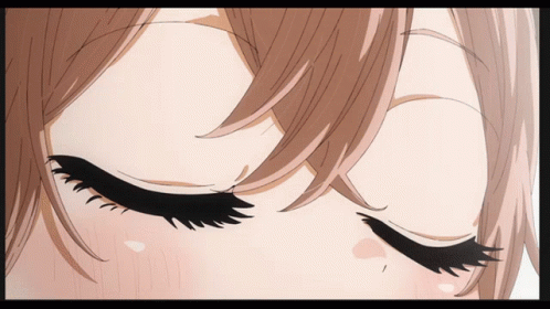 A Close Up Of A Girl 'S Eyes With A Very Long Eyelash GIF