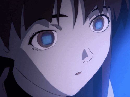 A Close Up Of A Girl 'S Face With A Blue Background GIF