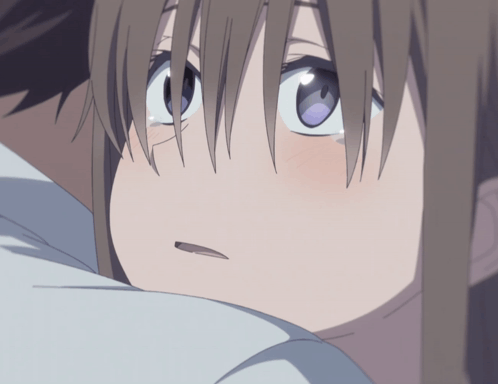 A Close Up Of A Girl 'S Face With A Blue Eye GIF