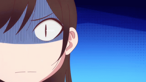 A Close Up Of A Girl 'S Face With A Cat Eye GIF