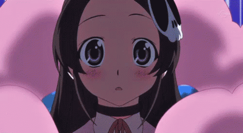 A Close Up Of A Girl 'S Face With A Pink Background That Says Tv Tokyo GIF