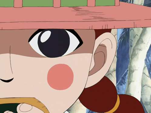 A Close Up Of A Girl 'S Face With A Pink Hat On GIF