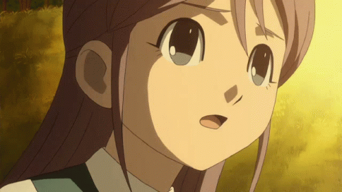 A Close Up Of A Girl 'S Face With A Serious Expression GIF