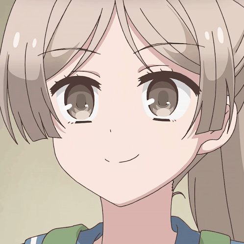 A Close Up Of A Girl 'S Face With A Smiling Expression GIF