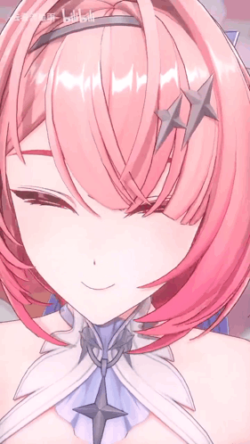 A Close Up Of A Girl 'S Face With A Star On Her Hair GIF