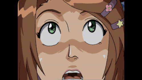 A Close Up Of A Girl 'S Face With A Surprised Look On Her Face GIF