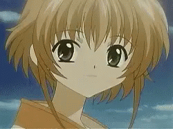 A Close Up Of A Girl 'S Face With Brown Hair GIF