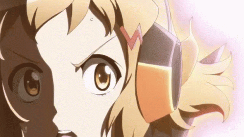 A Close Up Of A Girl 'S Face With Headphones On . GIF