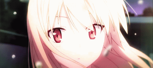 A Close Up Of A Girl 'S Face With Pink Eyes GIF