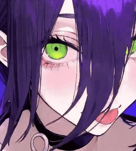 A Close Up Of A Girl 'S Face With Purple Hair And Green Eyes . GIF