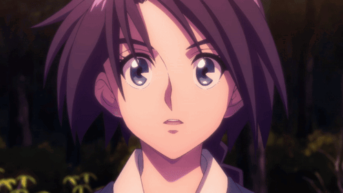 A Close Up Of A Girl 'S Face With Purple Hair GIF