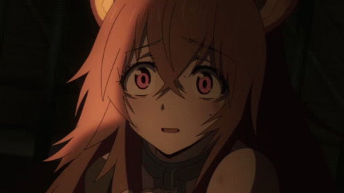 A Close Up Of A Girl 'S Face With Red Hair GIF