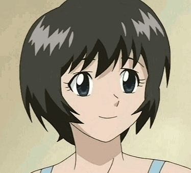 A Close Up Of A Girl 'S Face With Short Hair GIF