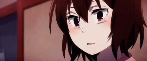 A Close Up Of A Girl 'S Face With Tears Coming Out Of Her Eyes . GIF