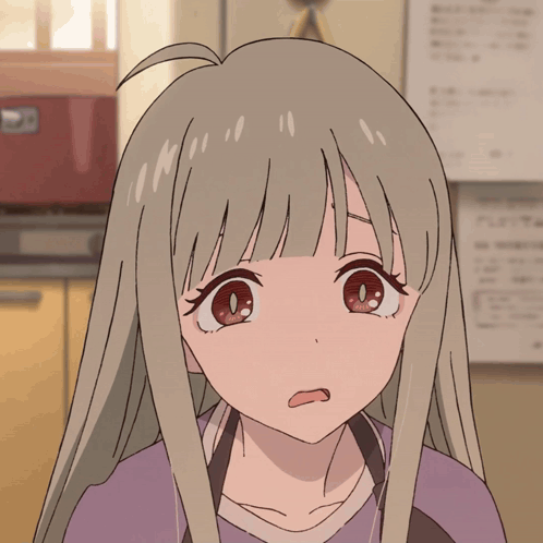 a close up of a girl 's face with tears running down her face