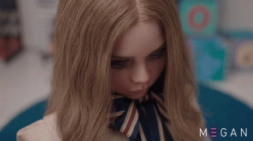 A Close Up Of A Girl 'S Face With The Name Megan On The Bottom Right GIF