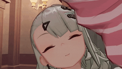 A Close Up Of A Girl 'S Face With The Number 8 On Her Hair GIF