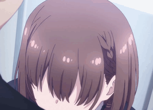 A Close Up Of A Girl 'S Head With A Purple Background GIF