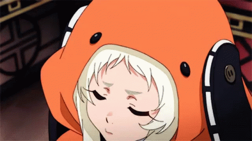 A Close Up Of A Girl Wearing An Orange Hoodie With Headphones On Her Head . GIF