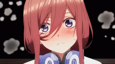 A Close Up Of A Girl Wearing Headphones With A Letter A On Them GIF
