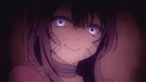 A Close Up Of A Girl With A Bandage Around Her Mouth And A Smile On Her Face . GIF