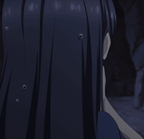 A Close Up Of A Girl With Long Dark Hair GIF