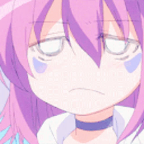 A Close Up Of A Girl With Pink Hair Making A Funny Face GIF