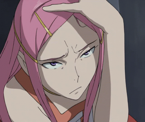 A Close Up Of A Girl With Pink Hair GIF