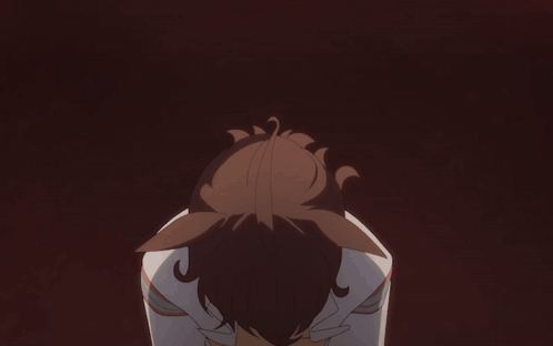 A Close Up Of A Girl With Red Eyes And A Headband GIF
