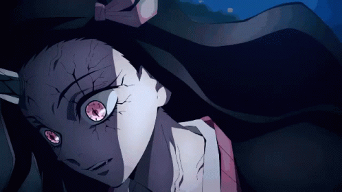 A Close Up Of A Girl With Red Eyes GIF