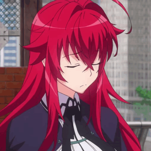 A Close Up Of A Girl With Red Hair GIF