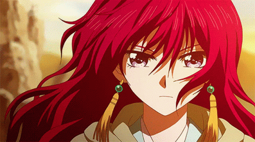 A Close Up Of A Girl With Red Hair GIF