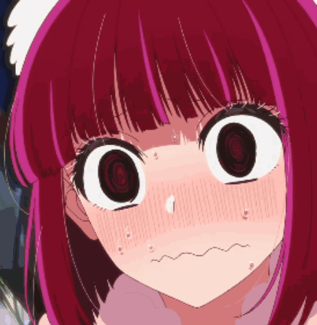 A Close Up Of A Girl With Red Hair Making A Funny Face GIF