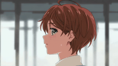 A Close Up Of A Girl With Short Hair GIF