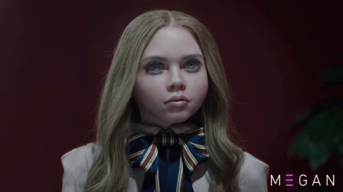 A Close Up Of A Girl With The Name Megan On The Bottom GIF