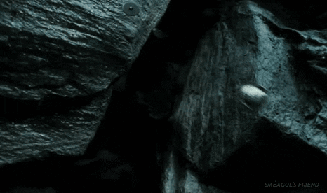 A Close Up Of A Gollum From The Lord Of The Rings Pointing At The Camera With His Finger . GIF